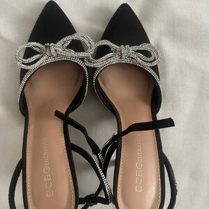 BCBGeneration Black Heels with Silver Bow Accents